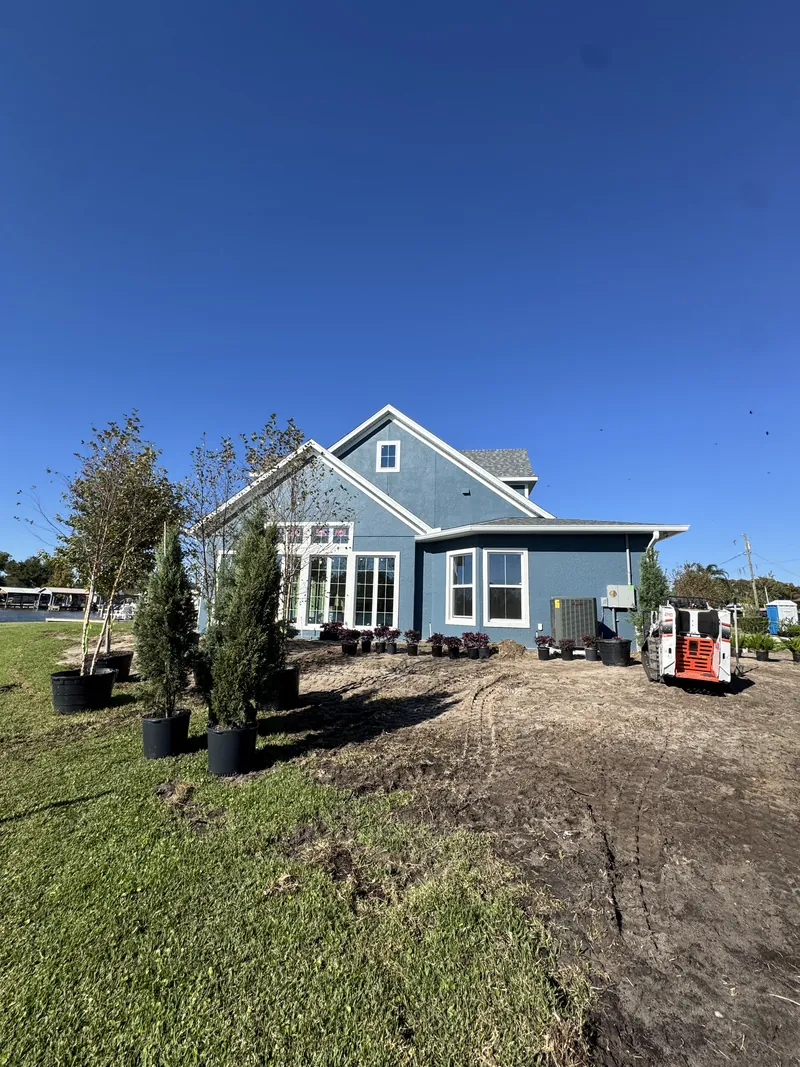 Landscape beds being prepared around a home