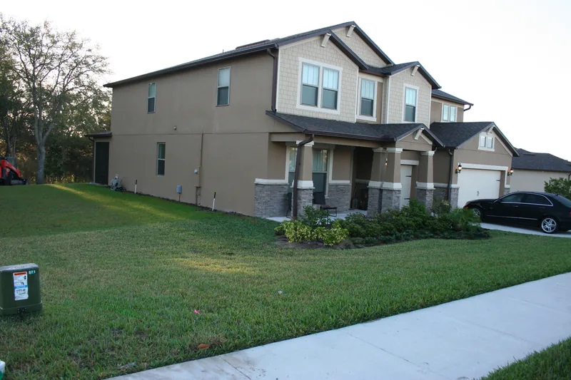 Before: the original front beds and lawn.